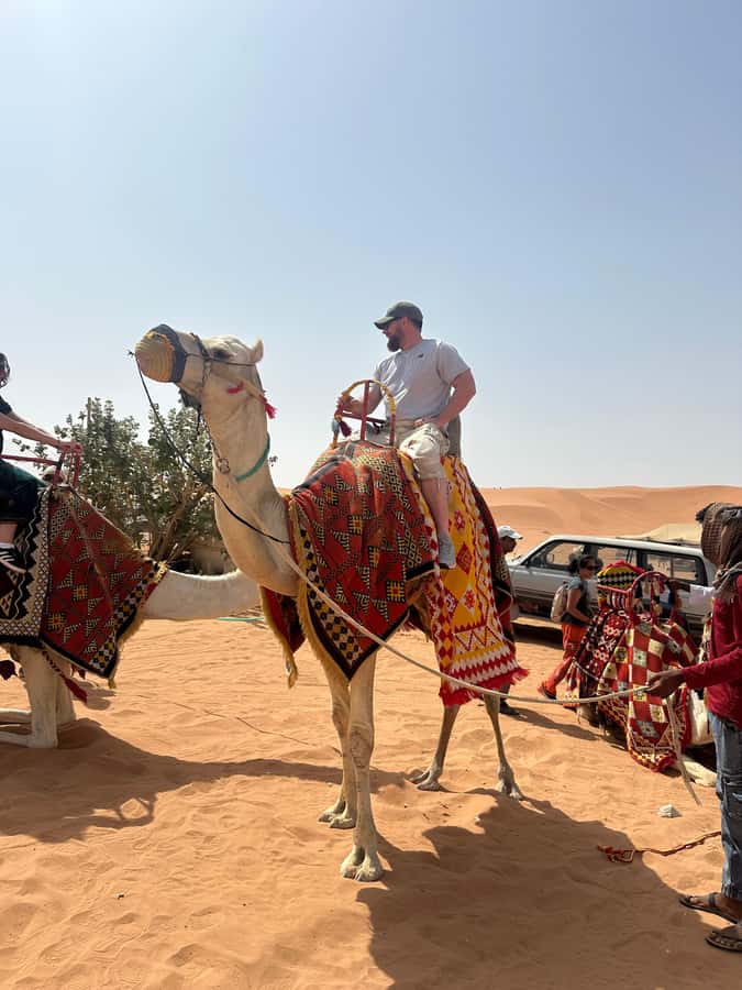Red Sand: Dunes ATV, + Camel Ride + sandboarding - Camel riding for about 10 minutes