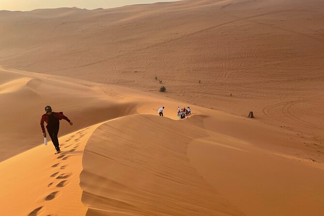 Red Sand Dunes Tour with Camel Ride ,Quad Biking, Heritage House - The campfire, dinner, and Arabic coffee